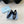 BALLERINA PUMPS WITH TRIANGLE LOGO AND BOW IN BLACK CALFSKIN