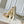 COUSSIN PM 26 IN CREAM RED MONOGRAM EMBOSSED LAMBSKIN GOLD HARDWARE