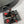 ALAIA BANQUET WEDGE SANDALS IN BLACK LAMBSKIN WITH RED HEART