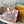 ONTHEGO VOYAGE 35 IN BROWN MONOGRAM CANVAS WITH VINTAGE HOTEL LABELS