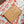 ONTHEGO EAST WEST 25 IN CORAL MONOGRAM TILES CANVAS
