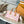 ONTHEGO EAST WEST 25 IN CORAL MONOGRAM TILES CANVAS