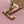 CAPUCINES EAST-WEST 33 IN BLUSH PINK CALFSKIN GOLD HARDWARE
