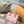 SPEEDY BANDOULIÈRE 20 IN CORAL MONOGRAM TILES CANVAS GOLD BUCKLE