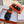 CHYPRE SANDAL IN BLACK DENIM AND VIVID ORANGE CALFSKIN