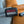 CLUTCH 22 WITH FF MOTIF IN DARK GRAY TEXTURED FABRIC AND BLACK LAMBSKIN TRIM