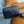 CLUTCH 22 WITH FF MOTIF IN DARK GRAY TEXTURED FABRIC AND BLACK LAMBSKIN TRIM