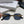 TRIOMPHE SUNGLASS 497823 IN GOLD METAL BLACK LENSES