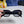 TRIOMPHE SQUARE SUNGLASS  566743 IN BLACK ACETATE GRADIENT SMOKE LENSES