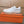 LV TRAINER IN EMBOSSED WHITE SUEDE