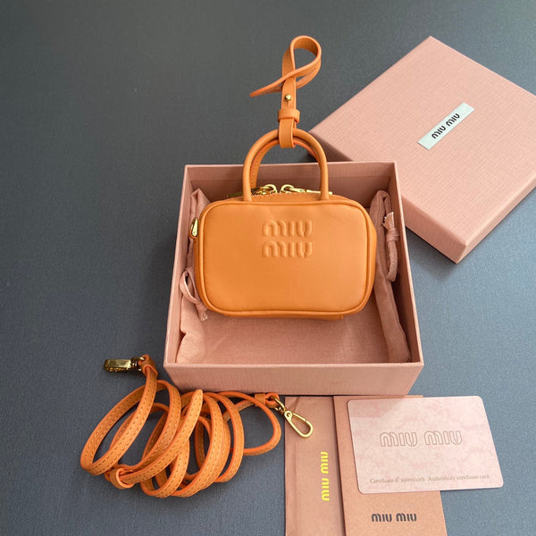 MICRO BAG KEYCHAIN 11 IN HOT CINNAMON ORANGE CALFSKIN EMBOSSED LOGO