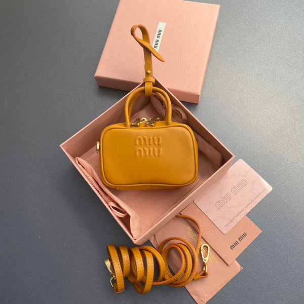 Miu 11 Happy Orange Beau Leather Micro Bag 240369