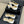 CC Classic Slingback White Goatskin Black Grosgrain 282282