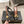 ALAIA SPIKE JEWEL MULES IN BLACK CALFSKIN WITH GOLD HARDWARE