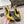 DUNE HIGH 10 CM SLINGBACK PUMPS IN CLASSIC YELLOW PATENT LEATHER WITH CRYSTAL