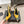 DUNE HIGH 10 CM SLINGBACK PUMPS IN CLASSIC YELLOW PATENT LEATHER WITH CRYSTAL