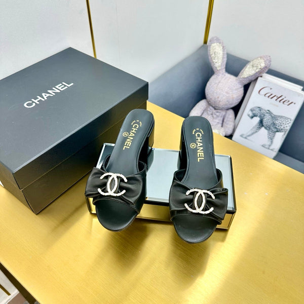 cc 25 bow mule sandal 50mm black sheepskin 238478