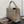 CAPUCINES MM 31 IN KHAKI BROWN TAURILLON