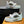 LV TRAINER SNEAKERS IN WHITE CALFSKIN AND CAMEL BROWN SUEDE