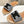 LYMPIA MULE IN TRIOMPHE JACQUARD WOOLLEN FABRIC BLACK CARO