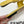 FENDI BAGUETTE SLIDES IN BRIGHT YELLOW LAMBSKIN