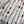 LV 25 Decorative Pattern Gemstone Chain Pleated Skirt White Poliester
