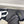 CC Flat Sandal In White Mix Black Calfskin
