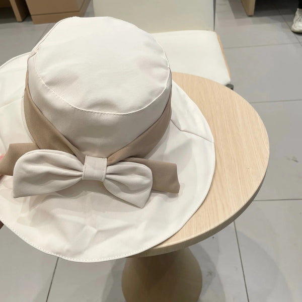 CELINE 25S BUCKET HAT 735013 IN IVORY
