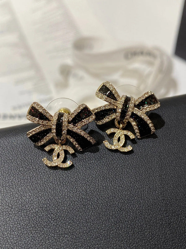 CC Crystals Black Enamel Bow Gold Earrings
