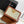 TEEN TRIOMPHE 18.5CM BEIGE MONOGRAM CANVAS AND TAN CALFSKIN